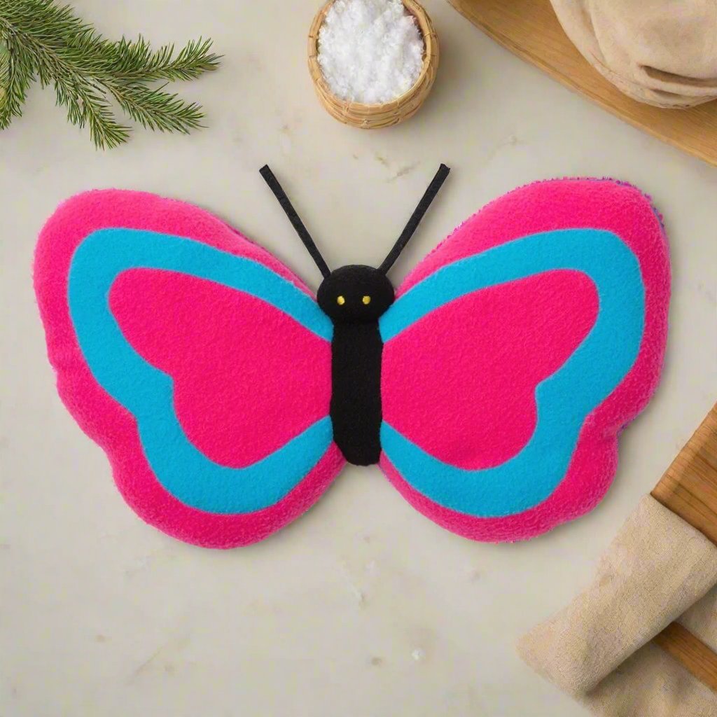 The HER-MINE Butterfly Heating Pad, a cute and cordless microwavable heating pad, featuring an adorable butterfly design with extra soft fabric, perfect for gifting teen girls or a special someone. This weighted, butterfly-shaped pad provides maximum comfort and can be easily reheated in the microwave, offering convenient and stress-relieving warmth. Its mild scent enhances relaxation, making each use a soothing experience. The heating pad combines warmth with a comforting, plush embrace, creating an ideal