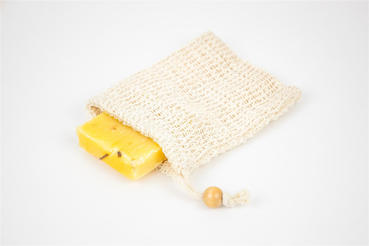 Exfoliating soap saver, designed to hold soap and gently scrub skin during use.