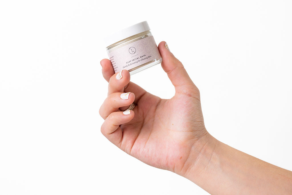 2oz jar of Facial Clay Mask, designed to cleanse and detoxify the skin for a refreshed, glowing complexion.