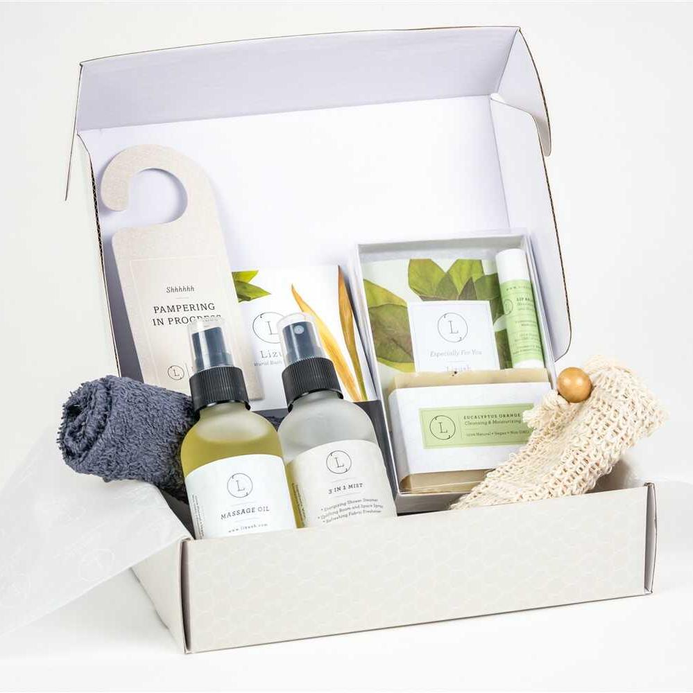 Natural refreshing spa set in eucalyptus scent, designed for men or women to promote relaxation and stress relief. The set includes a 4 oz glass bottle of massage oil, a 4 oz glass bottle of eucalyptus mist for energizing showers, freshening spaces, and fabrics, a 4 oz eucalyptus natural soap bar, an exfoliating soap saver, natural lip balm, and a face towel. All items are beautifully packaged in a gorgeous box (8''x6''x3'') that can be personalized with the recipient's name on the lid. A personal note can