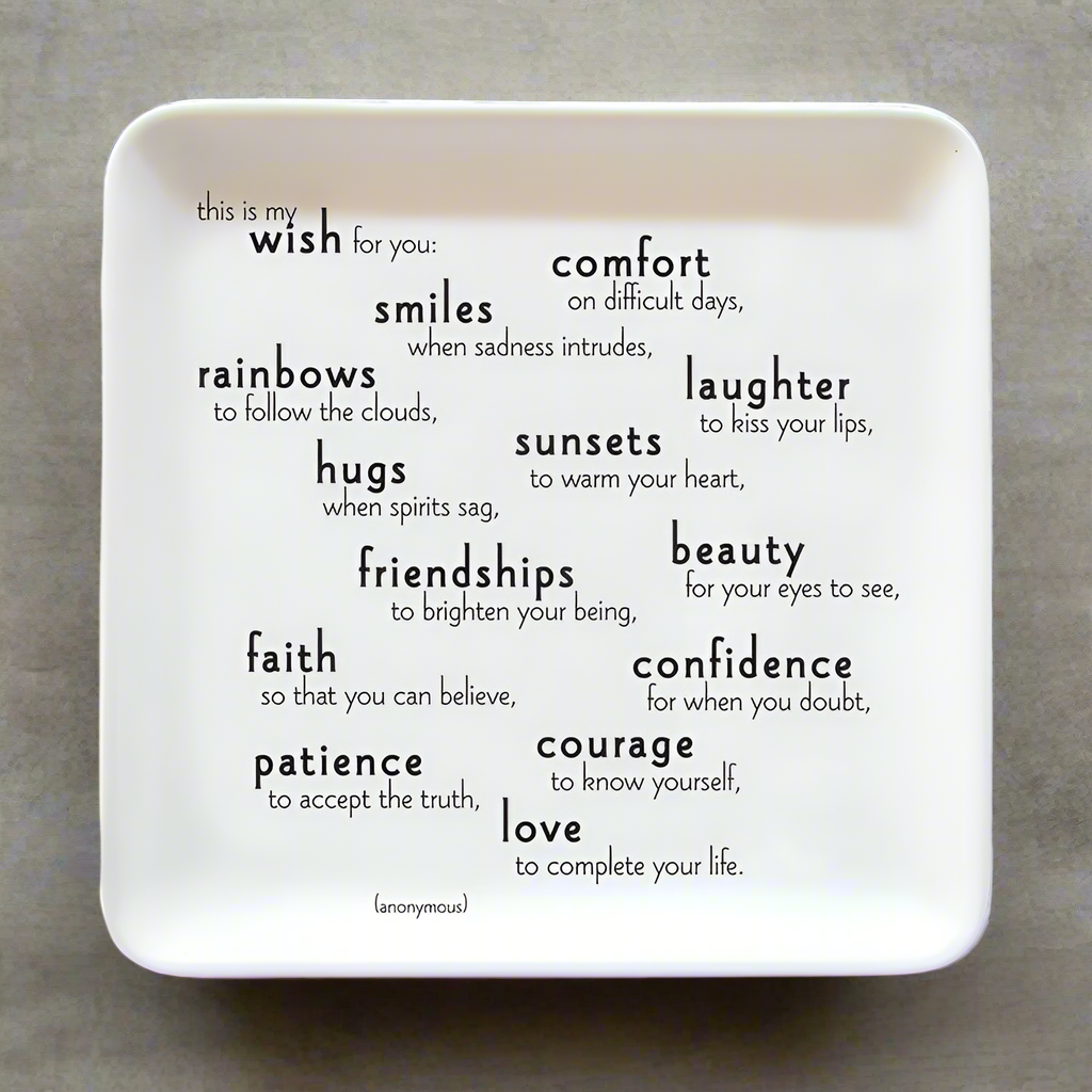 The 'My Wish For You' Empowerment Trinket Dish, a 5-inch square ceramic dish with a matte glaze, perfect for holding jewelry, keys, and small treasures. This versatile and stylish dish features inspiring words of encouragement, adding a touch of positivity to any space. Designed for modern living, it is microwave and dishwasher safe, making it both practical and beautiful. The dish is adorned with a heartfelt message that includes wishes for comfort, joy, and love, making it an ideal addition to your home o